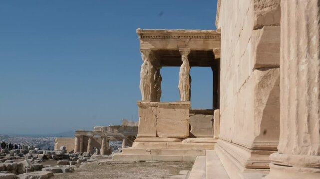 Acropolis in Greece, Parthenon in Athens drone aerial view, famous Greek tourist attraction, Ancient Greece landmark - Caryatids statue Temple Unesco Heritage world 