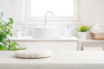 Marble round podium and table for product display on blurred bathroom window interior background