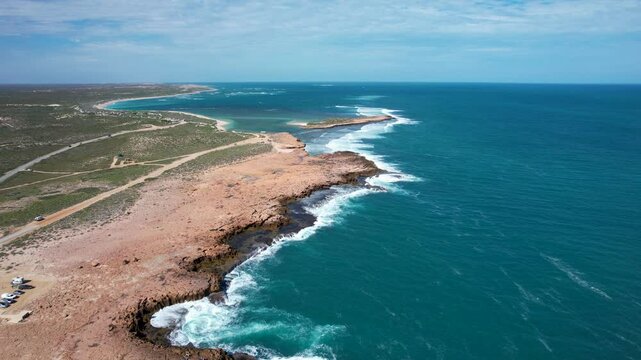 Aerial view of the beautiful Quobba blowholes and rugged coastline with crashing waves, Carnarvon, Australia.