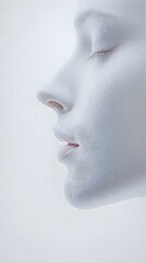 84. A side profile of a face with a smooth forehead, defined cheekbones, and sharp jawline, white backdrop