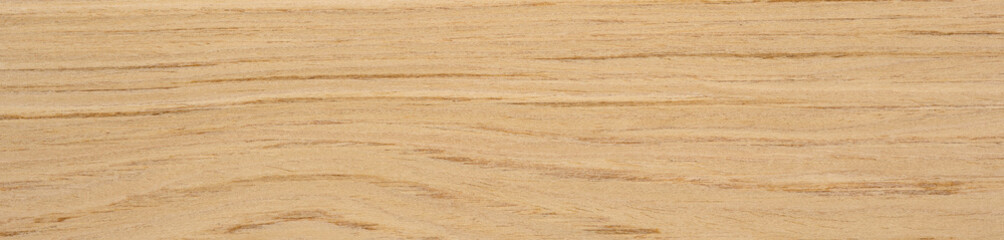 Fototapeta premium Slavony oak veneer surface with waves of honeyed grain flowing across a smooth canvas