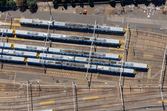 Aerial view of urban railway station with tracks and modern architecture, Epping, Victoria, Australia.
