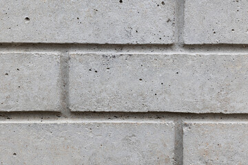 Brick background, brick gray concrete texture. Brick surface. Close up.