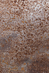 Rusty background, metal texture. Metal oxidizes with age. Rusty surfaces. Close-up from above.