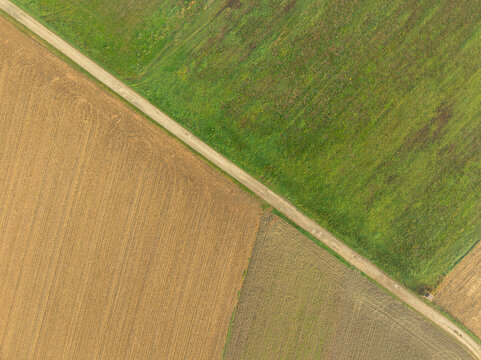 Aerial view of beautiful green farmland with patterns and lines, Gillersdorf, Austria.
