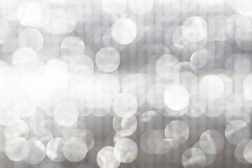 Abstract blurred grey light bokeh background, festive season concept background, grey bokeh pattern background