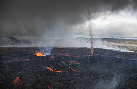 Aerial view of the majestic Fagradalsfjall volcano with lava flow and a dust devil, Grindavik, Iceland.