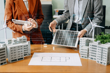 Business team people planning hand using laptop for working technology and business Net zero and...