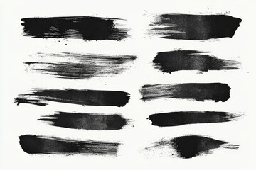 Collection of black brush strokes showcasing texture and artistic flair on a white background