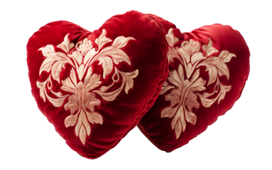 Two velvet heart-shaped pillows on white & transparent a background.