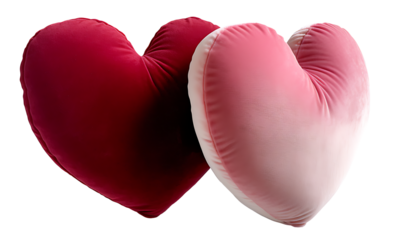 Two velvet heart-shaped pillows on white & transparent a background.