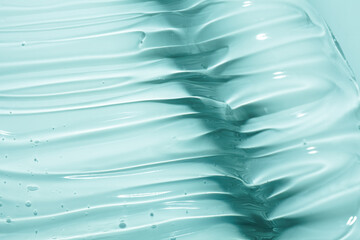 Cream gel green blue transparent cosmetic sample texture with bubbles isolated on white background