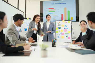 Team of professional business people join hands to brainstorm creative agency business ideas,...