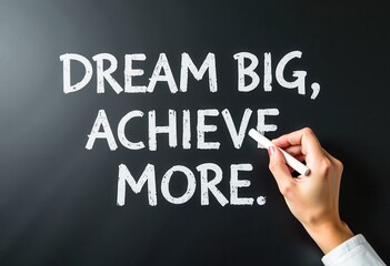Fototapeta premium Dream Big, Achieve More: Handwriting Inspires Success on a Blackboard Motivational quotes best for wall art or print