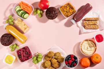 Frame with premade animal protein free salad, snack, smoothie. Quick food for lunch break, ready vegan meals, copy space