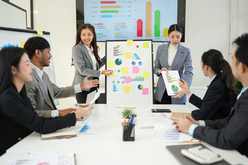 Team of professional business people join hands to brainstorm creative agency business ideas, meetings, presentations, planning, strategies, new business development in modern office company.