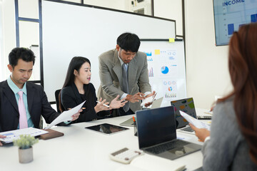 Business team brainstorming for planning strategies, laptop meeting with collaboration to present group project in office.