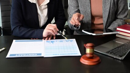 business people and lawyers discussing contract papers sitting at the table. Concepts of law, advice, legal services