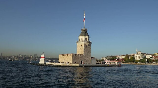 A beautiful view of the famous ancient Kız Kulesi, Maiden's Tower, Leandros Tower on a small island in the Marmara Sea from a boat in İstanbul Turkey.