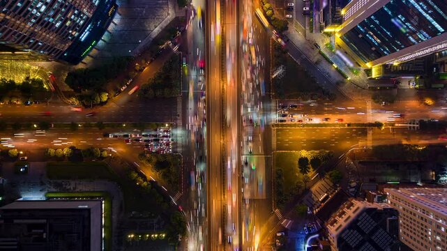 Aerial timelapse of evening traffic at intersection in Hanoi, Vietnam
