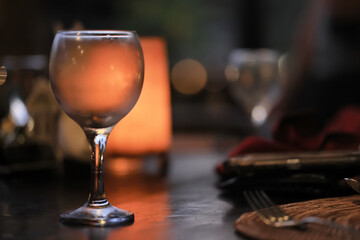 A glass of white wine on a blurred abstract background, alcohol, relaxation