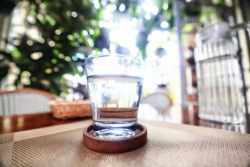 a glass of cold water on the table in the restaurant