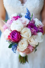 Obraz premium Elegant Bridal Bouquet with Pink and White Flowers on Wedding Day