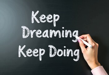 Fototapeta premium Delicate Hand Writes Inspiring Words on Blackboard: Keep Dreaming, Keep Doing Motivational quotes best for wall art or print
