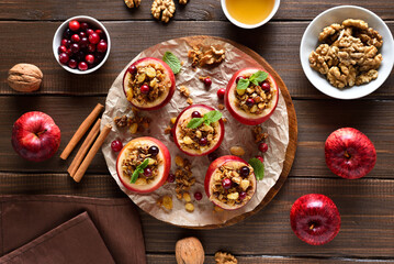 Stuffed apples with granola, cranberries, nuts and honey