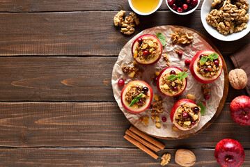 Stuffed apples with granola, cranberries, nuts and honey