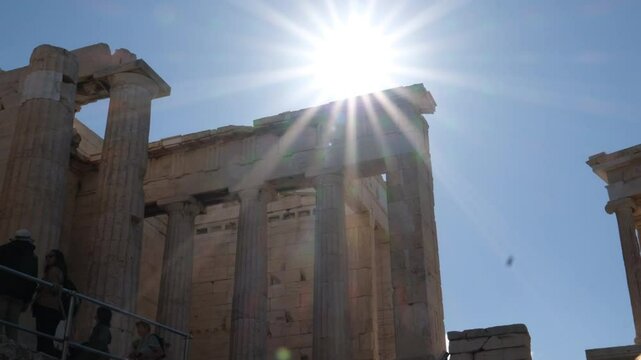 rays of sun in sky Detail of facade of Odeon of Herodes Atticus, Acropolis, Athens, Greece