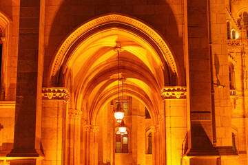 Naklejka premium Archway of Hungarian Parliament Building at Night