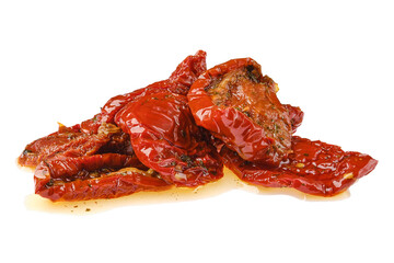 Sun-dried tomatoes piled on a white surface ready for cooking or snacking