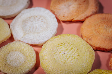 A macro shot of freeze-dried slices showcasing their deep, colorful hues, crunchy texture, and intricate patterns. Great for food, nutrition, and healthy snack themes.
