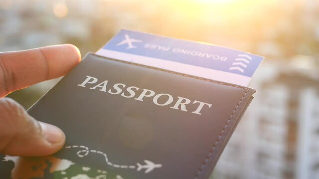 Preparing for travel with passport and boarding pass in hand