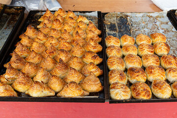 Assorty of Bukhara samsa on sale at bazaar, Uzbekistan. Samsa from the Persian 