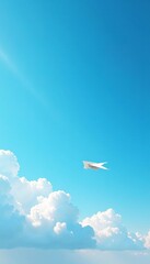 Fototapeta premium Cloudy blue sky with a small paper plane visible, fluffy, clouds, wispy