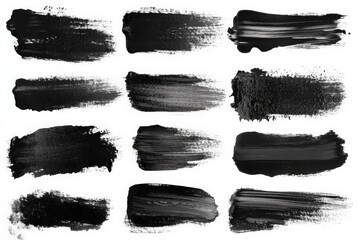 Various black paint strokes on a white background created for artistic expression and design purposes