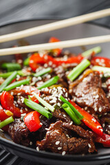 fried juicy spicy Chinese beef in sweet and sour sauce