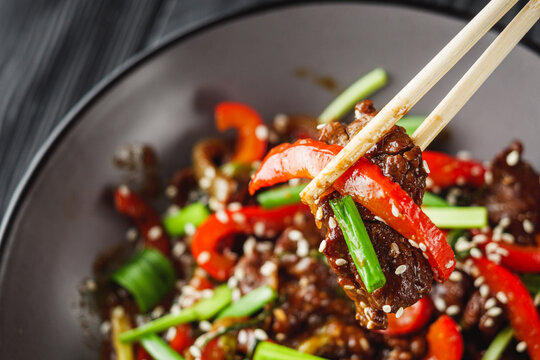 fried juicy spicy Chinese beef in sweet and sour sauce