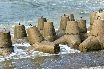 This picture illustrates the numerous Tetrapods breakwater at beautiful Shankarpur beach