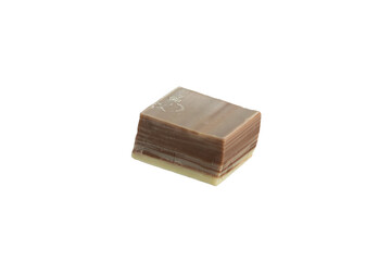 Close-up of a delectable layered chocolate candy, showcasing its rich, creamy texture and intricate design.
Milk and dark chocolate, photographed against a clean white background.