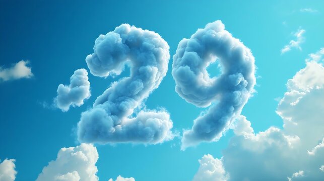 Fluffy cloud numbers '29' against a bright blue sky, ideal for showcasing a countdown or celebration theme, capturing a whimsical atmosphere.