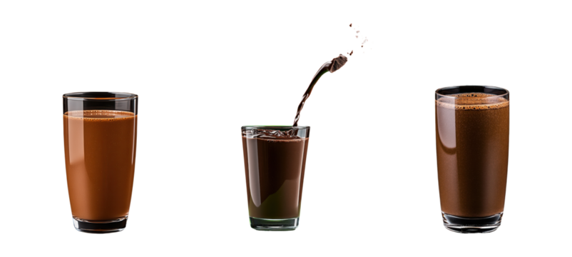 Chocolate milk splashes in glasses with floating chocolate pieces