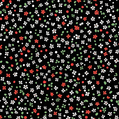 Seamless floral pattern with tiny white and red flowers on a black background