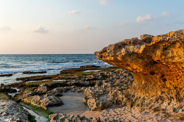 Interesting rock formation on the northern coast of Israel with the Mediterranean Sea behind it.
