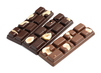 Tasty chocolate bars with nuts isolated on white