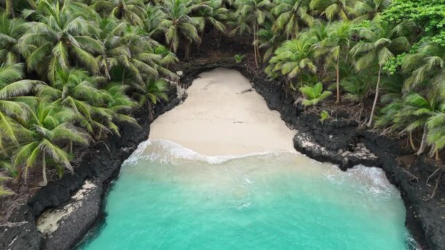 Sao Tome and Principe - Battery Beach at Ilheu das Rolas. Pristine Equatorial Island With Turquoise Waters and Lush Palm Forest.