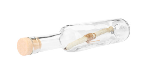 Corked glass bottle with rolled letter isolated on white