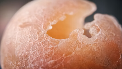Fototapeta premium Macro Shot of a Damaged Orange Fruit Surface Texture